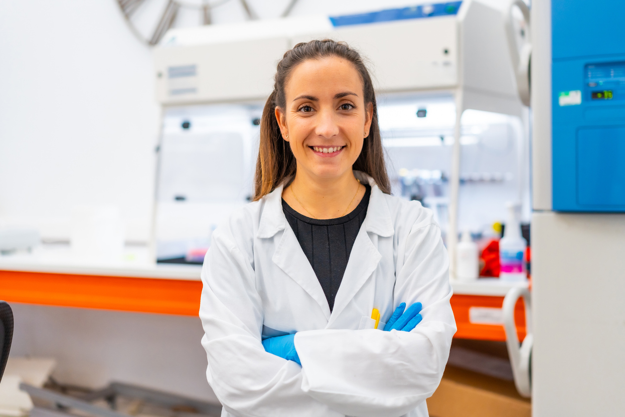 Portrait of a young and proud biologist in a laboratory