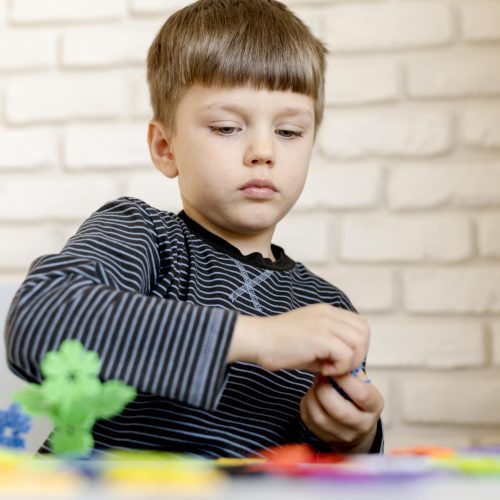 little-kid-playing-indoors